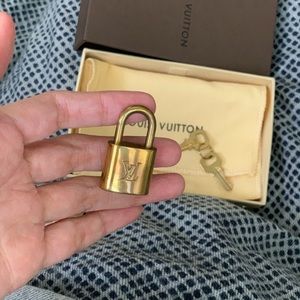 Authentic Louis Vuitton polished brass locket and keys #306 (NEW in box)